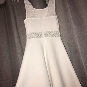 White dress with lace straps.